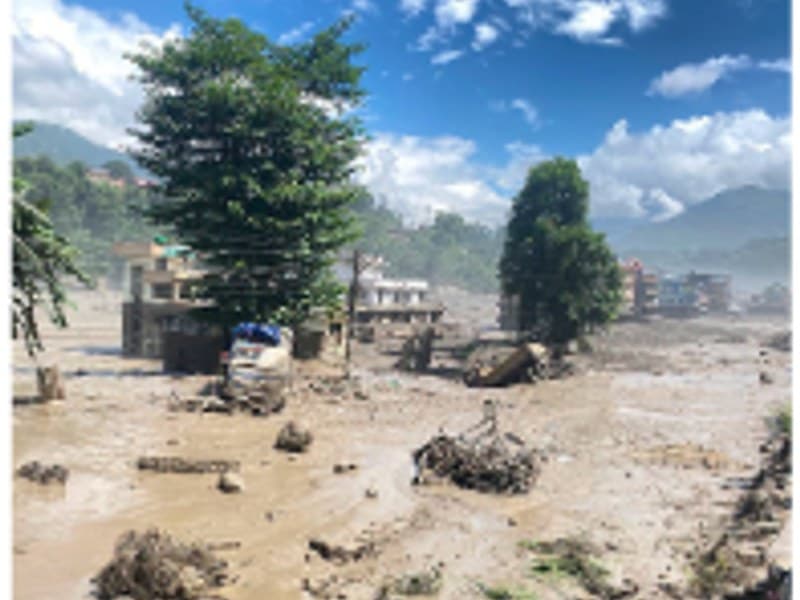 Mud, rubble and damaged buildings left behind after the floodwater receded